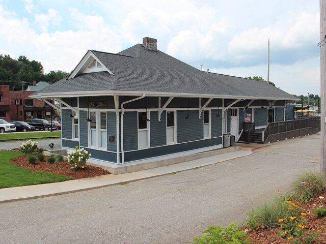  Ridge train depot" image by Thomson M is licensed under CC BY 3.0.